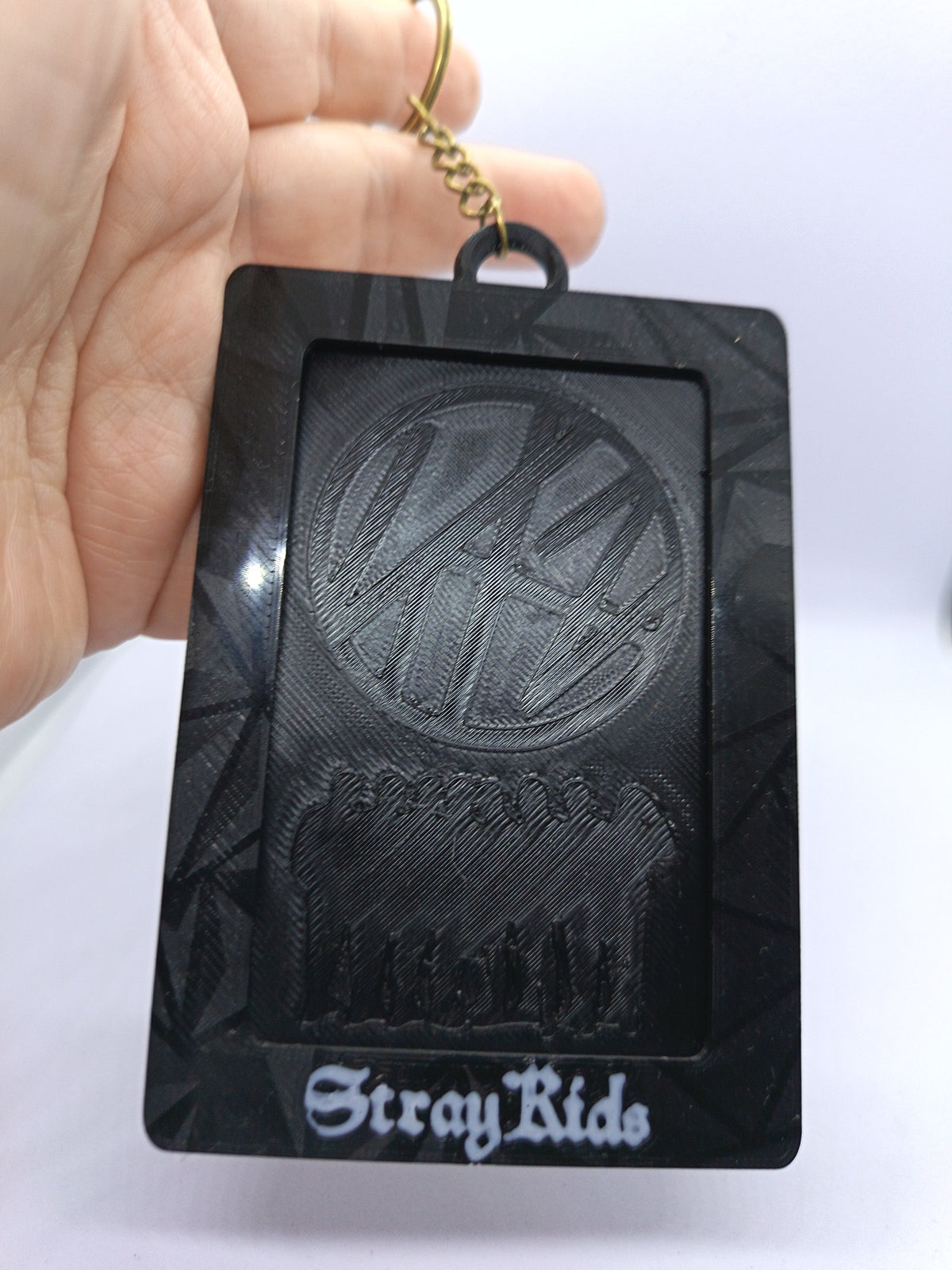 Holder para photocard Stray Kids, ventana frontal y marco negro con nombre Stray Kids.