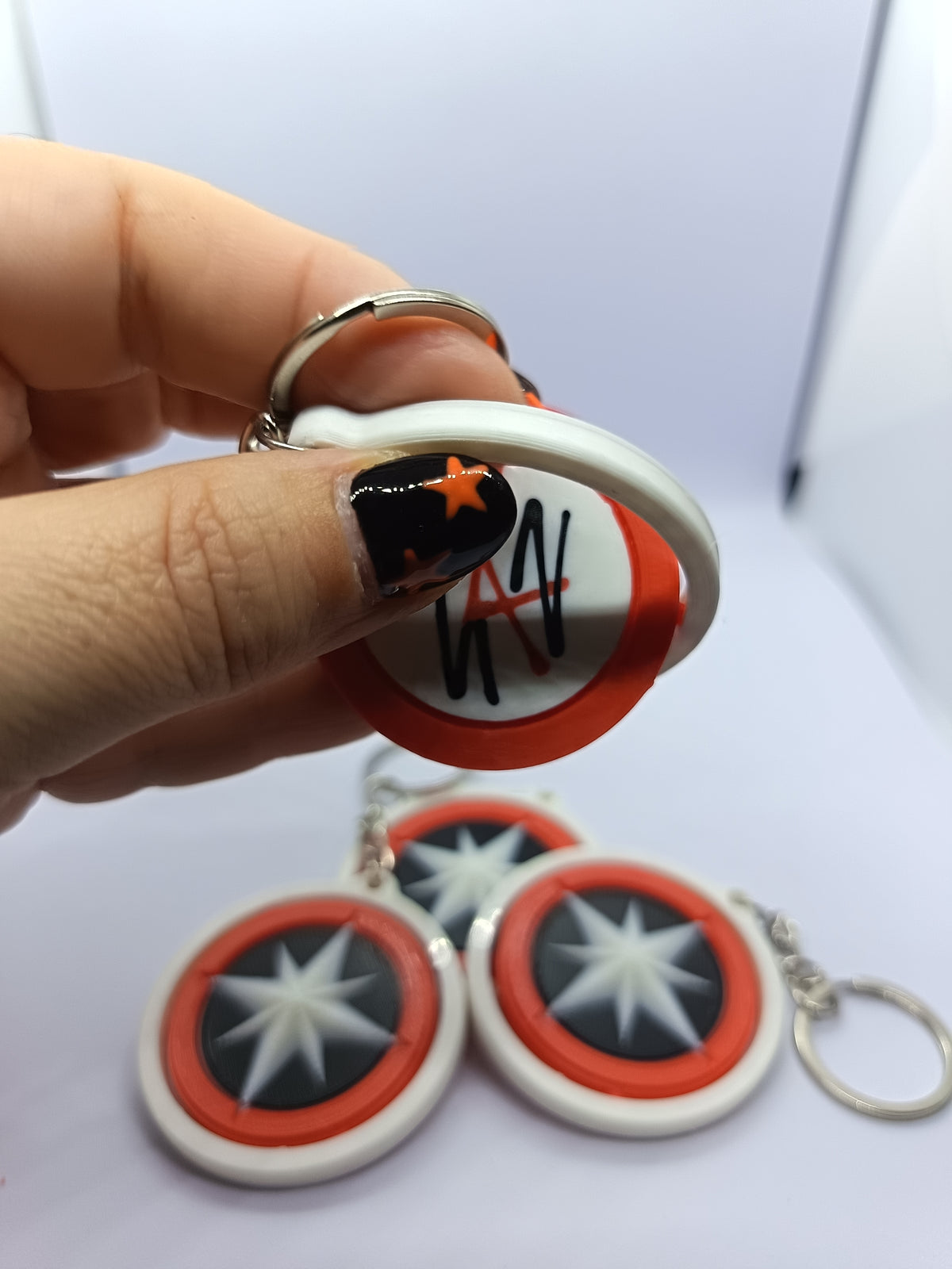 Llavero Stray Kids con logo giratorio, fotografía 1 del producto.